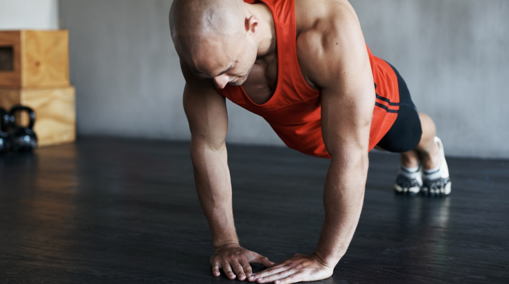 Man doing diamond push ups