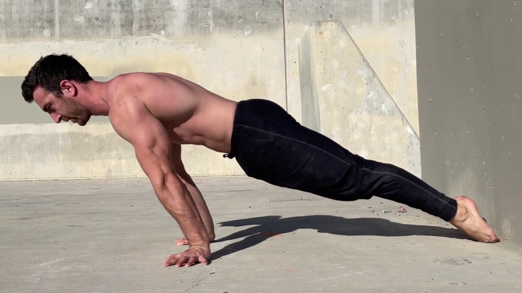 Man doing Pseudo Planche Push Ups
