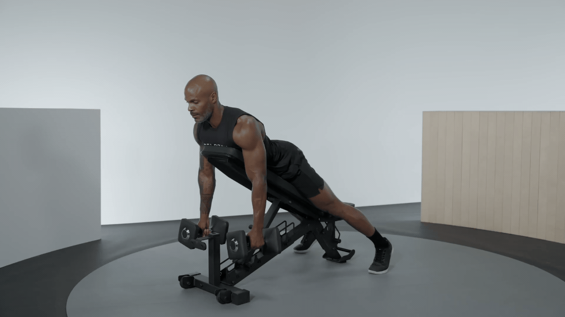 Man doing Chest-Supported Dumbbell Rows