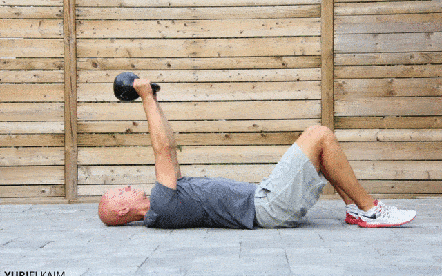 Man doing Kettlebell Tricep Pullover