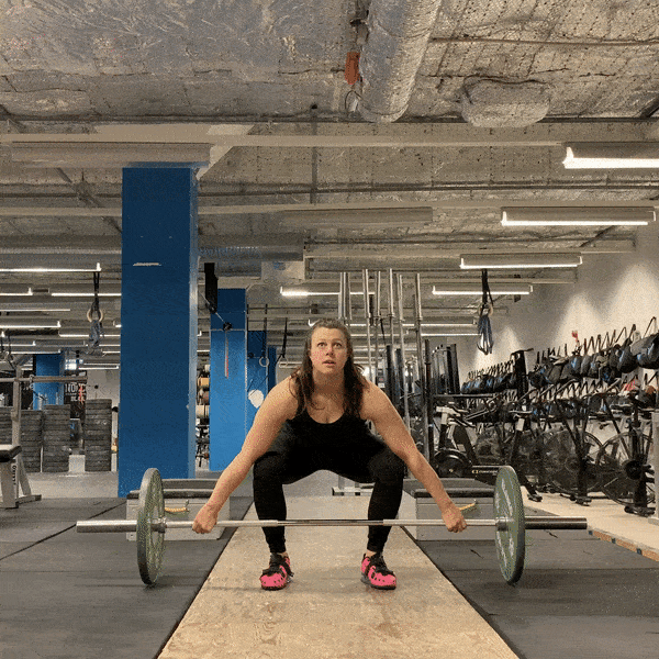 Woman doing Snatch-Grip Deadlifts