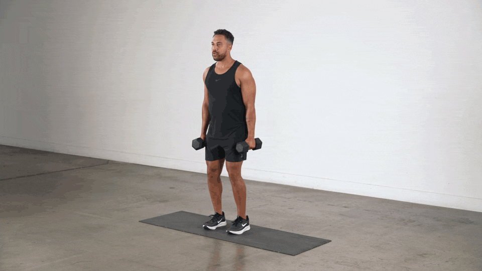 Man doing Standing Dumbbell Calf Raise