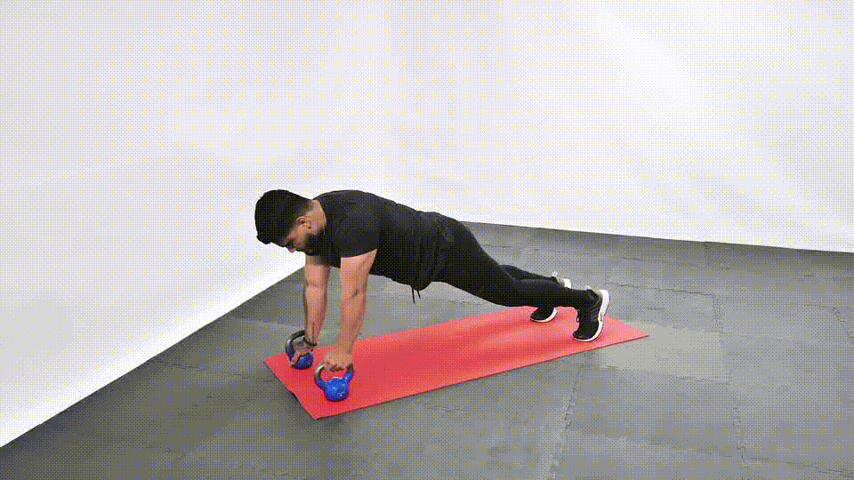 Man is doing Kettlebell Renegade Row