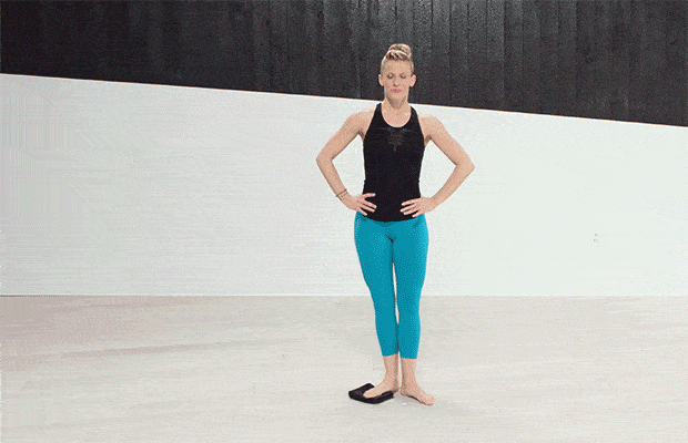 Woman doing Adductor Slide on Sliders