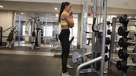 Woman doing Cable Front Squat