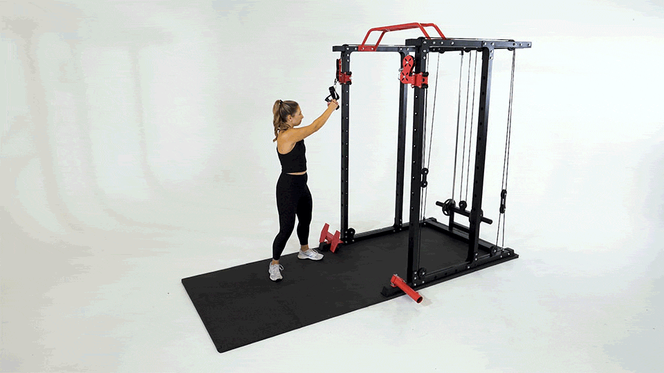 Woman doing Cable Woodchopper