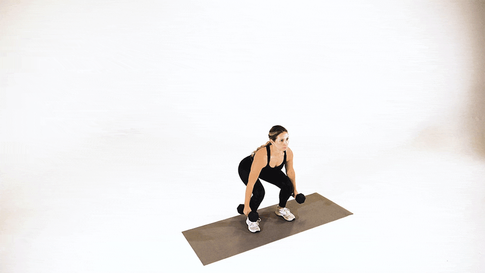 Woman doing Dumbbell Jump Squat