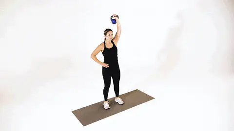 Woman doing Kettlebell Clean to Press