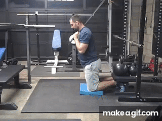 Man is doing Banded Nordic Curl